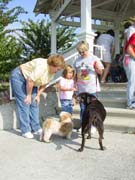 Pastor Barb visiting with pets and pet lovers