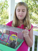 Lizzie with her hamsters
