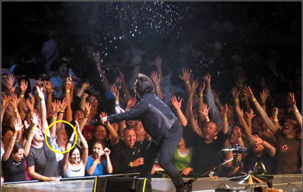 Dylan is in the yellow circle in this concert photo