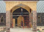 Wood arches in place, with more bracing to be added
