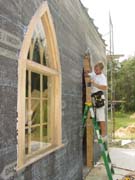 Charlie working on an arched-top doorway