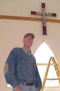 Chris Roberts with the cross he made for King of Peace
