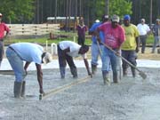 Finishers working the concrete