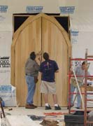 Lacey Builders installing the front door