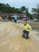 playing on the dirt piles