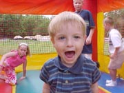 Andrew having fun on the moon bounce