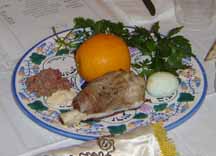 Seder plate with non-traditional orange